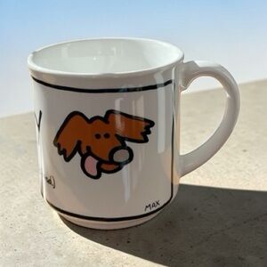 Humorous coffee mug that spells it out, (I heart my dog’s head) made in Japan